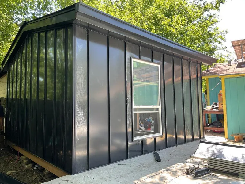 Black standing seam metal wall panels for Metal Roof Installation in West Manheim